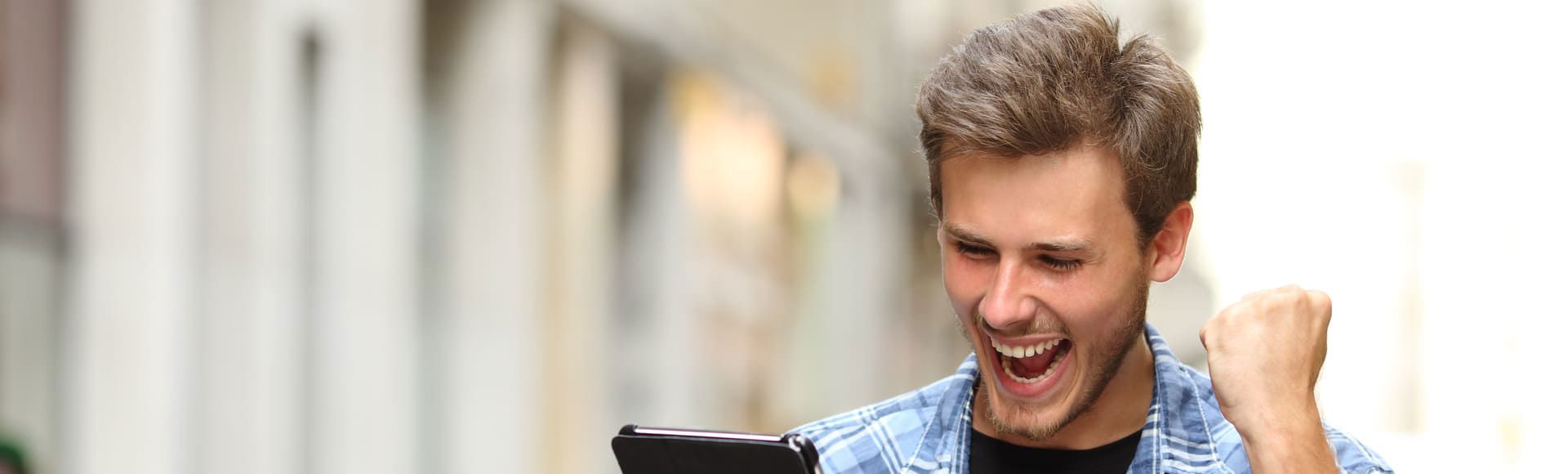 happy man celebrating an achievement.