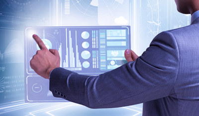 A businessman in a suit interacts with a futuristic touchscreen dashboard displaying data visualizations.