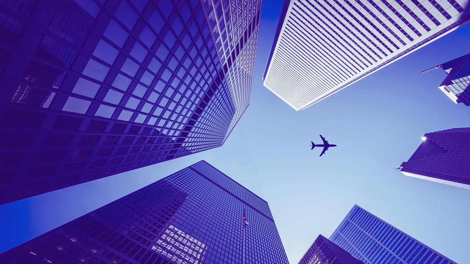 Airplane flying over the city.