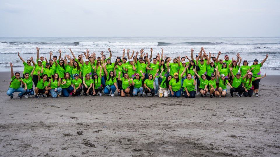 Volunteers participating in a beach cleanup activity.