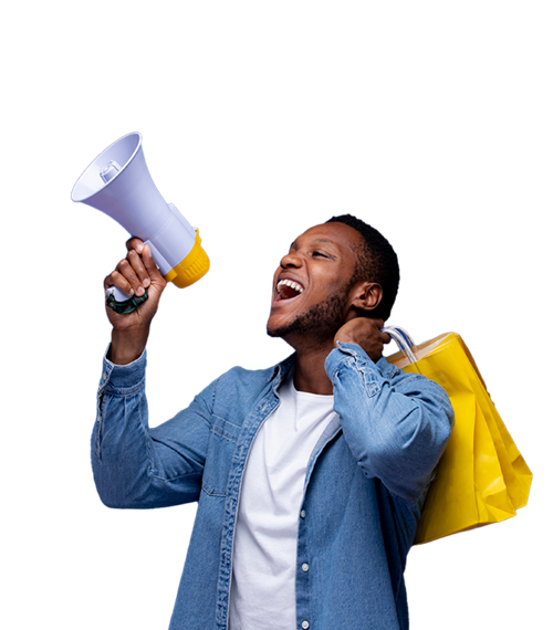 a person holds a megaphone in their right hand, appearing to shout, while carrying yellow shopping bags on their left arm. they wear a denim shirt over a white t-shirt.