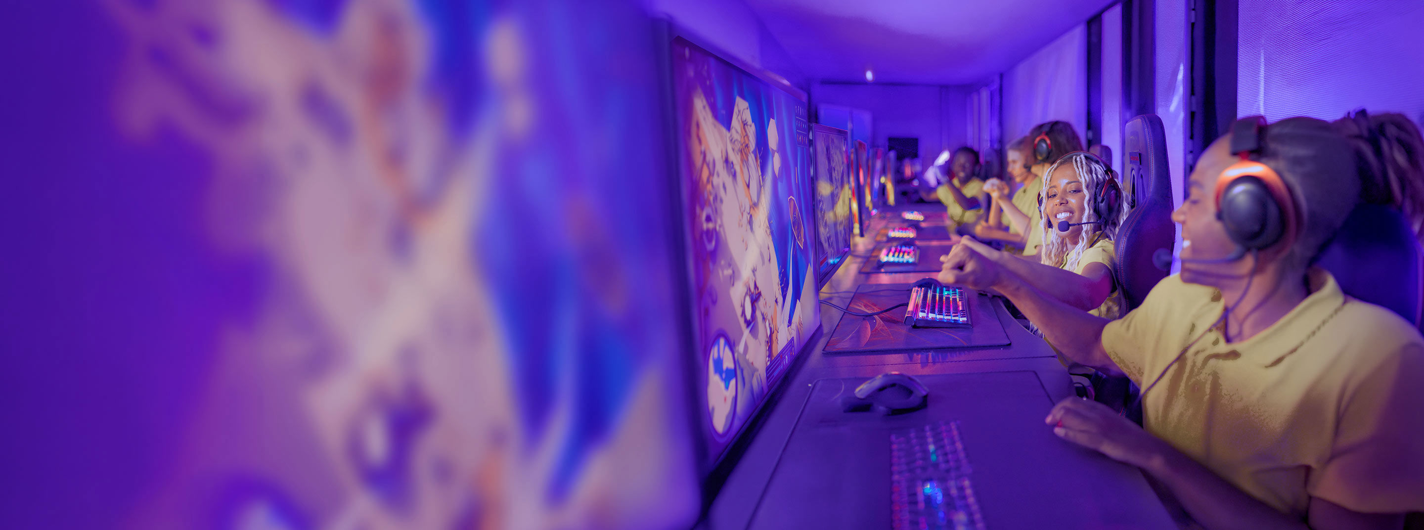 Professional gamers playing on a modern game arena.