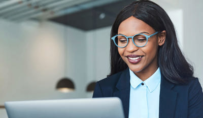 African business woman working on her laptop 