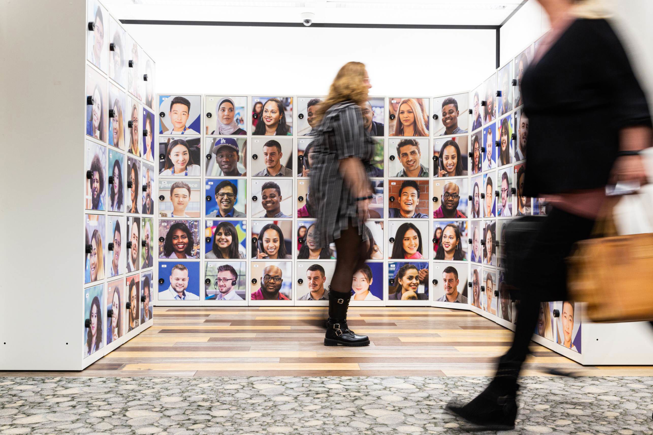 TP employees walking through office corridors in Utrecht.