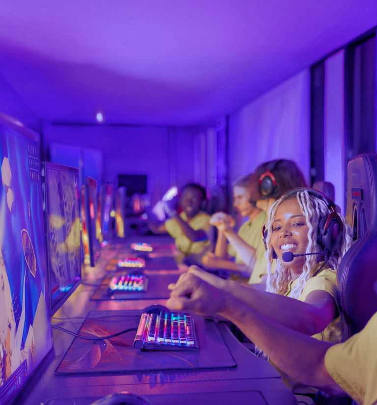 Professional gamers playing on a modern game arena.