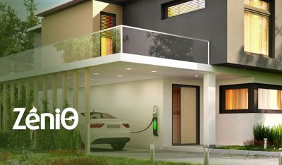 Electric car charging at an ultramodern home.