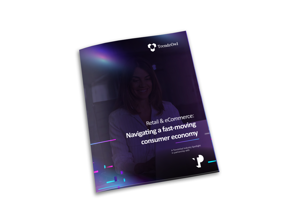 Smiling businesswoman working on a laptop, representing B2B strategies for navigating a fast-moving consumer economy.