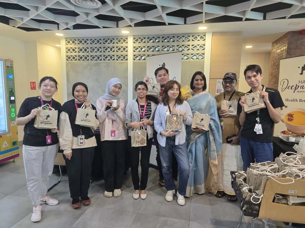 TP team members gathered together showing team spirit.