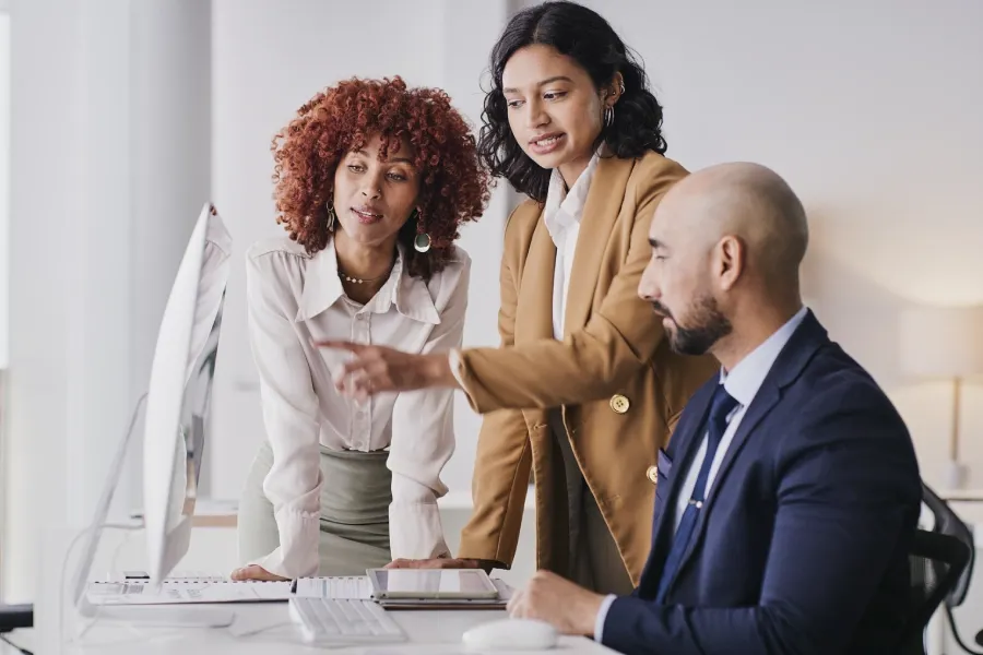 Employee working confidently and contributing to business growth at scale.