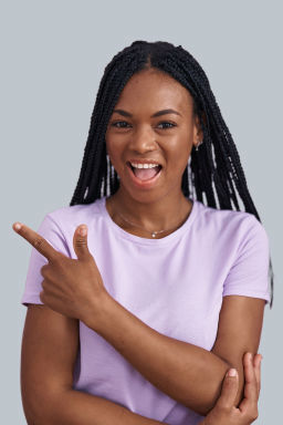 Woman pointing her finger at the important information on the screen.