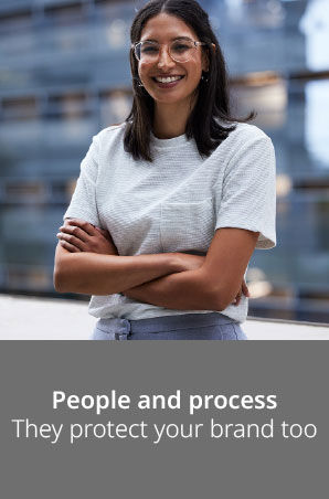 Smiling woman with arms crossed