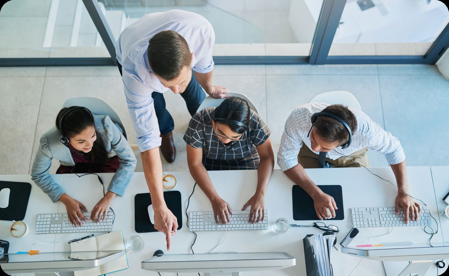 Group of employee receiving instructions from a supervisor