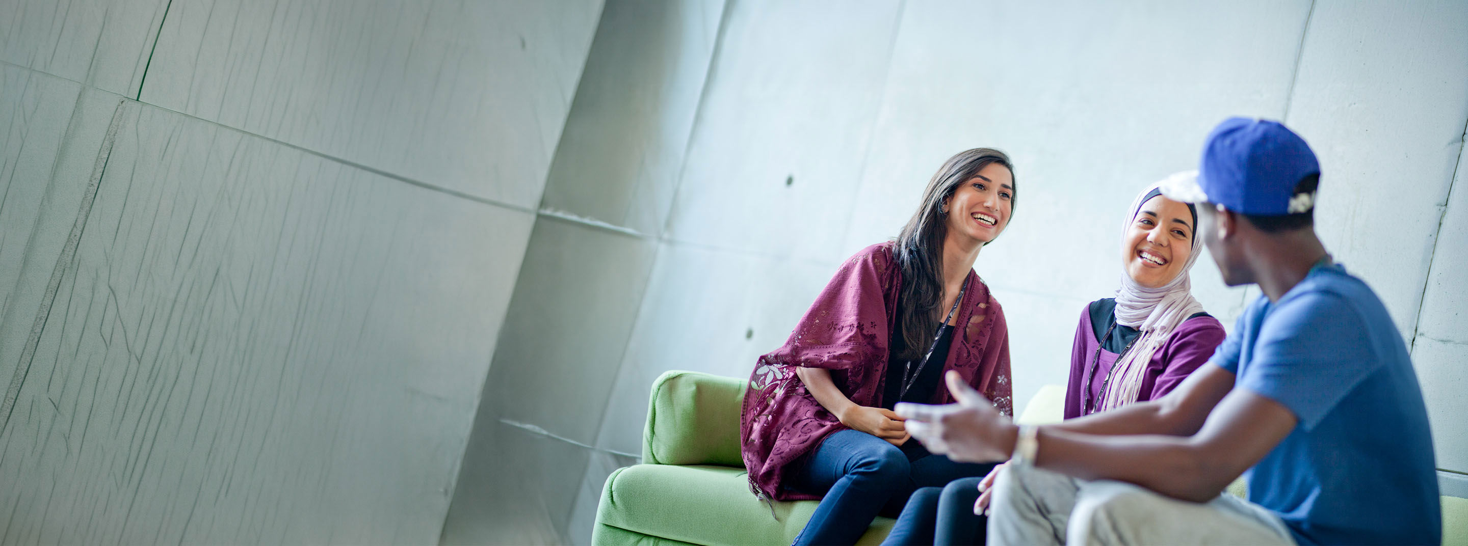TP employees connecting and sharing ideas in a workplace recreation area.